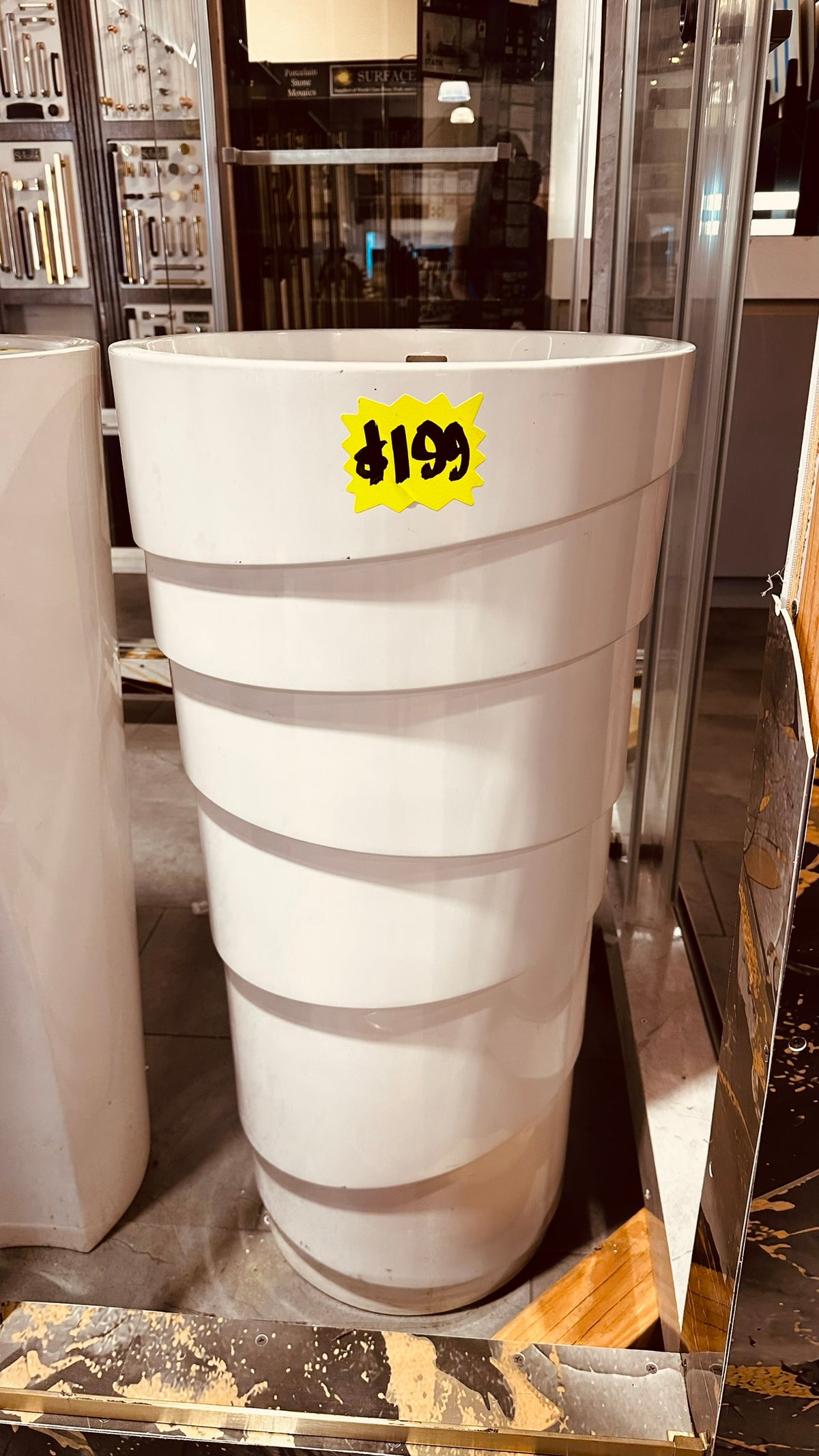 White pedestal bathroom sink with ribbed design, clearance