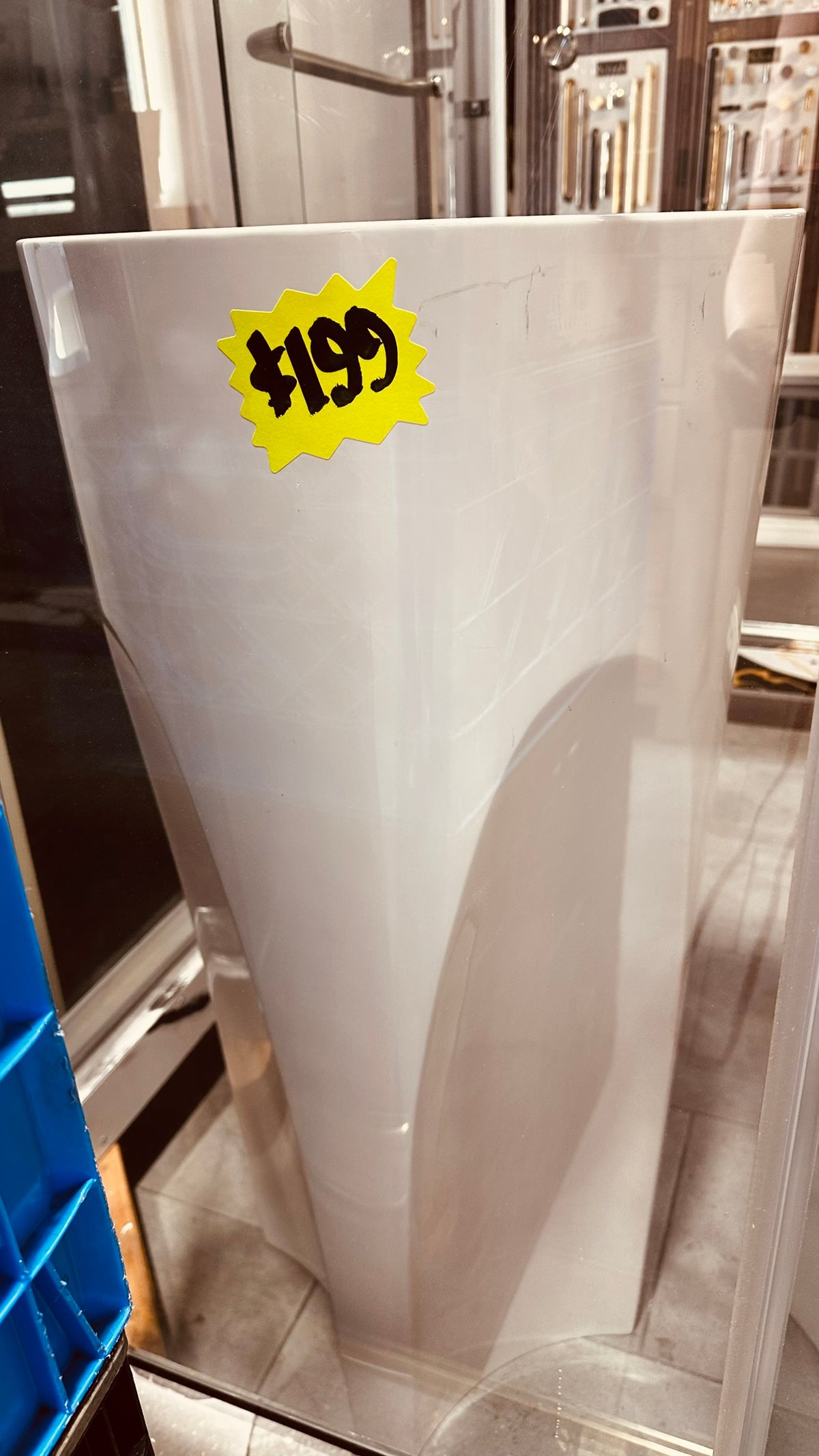 White pedestal bathroom sink with angular design, clearance
