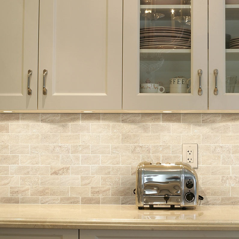 Aria Oro 2x4 Porcelain Mosaic installed in a finished room
