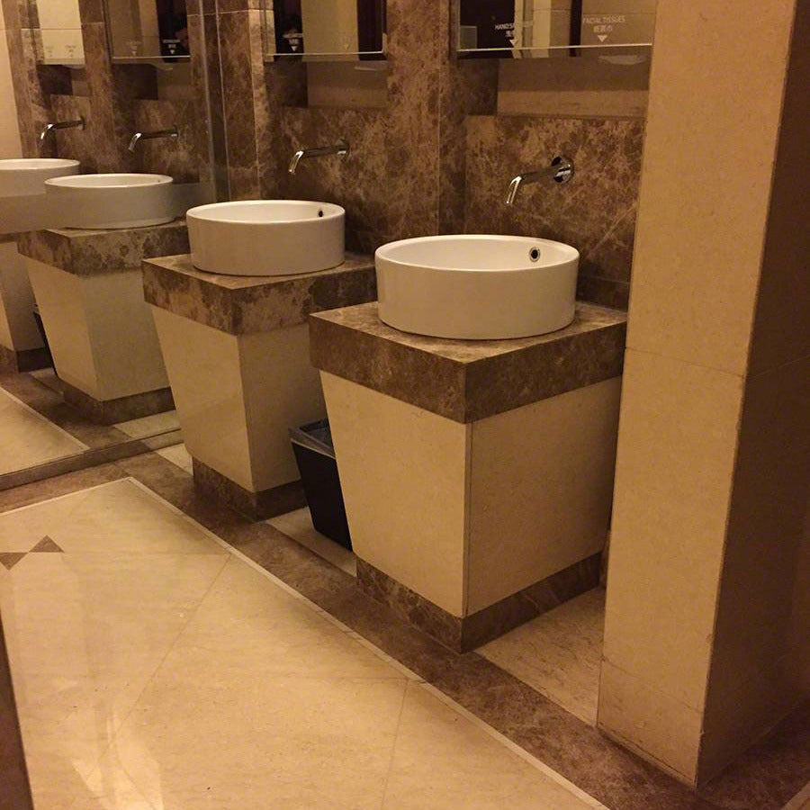 Emperador Light Marble Tile installed in a room setting