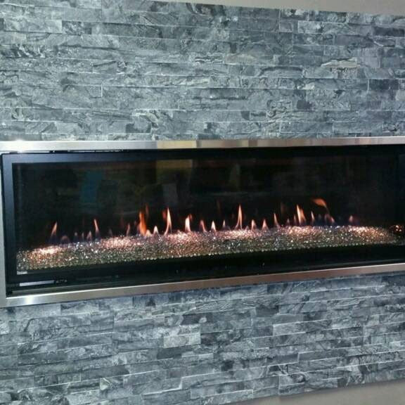 Glacial Black Rockmount Stacked Stone Decorative Wall Panels shown installed in a finished outdoor or living space