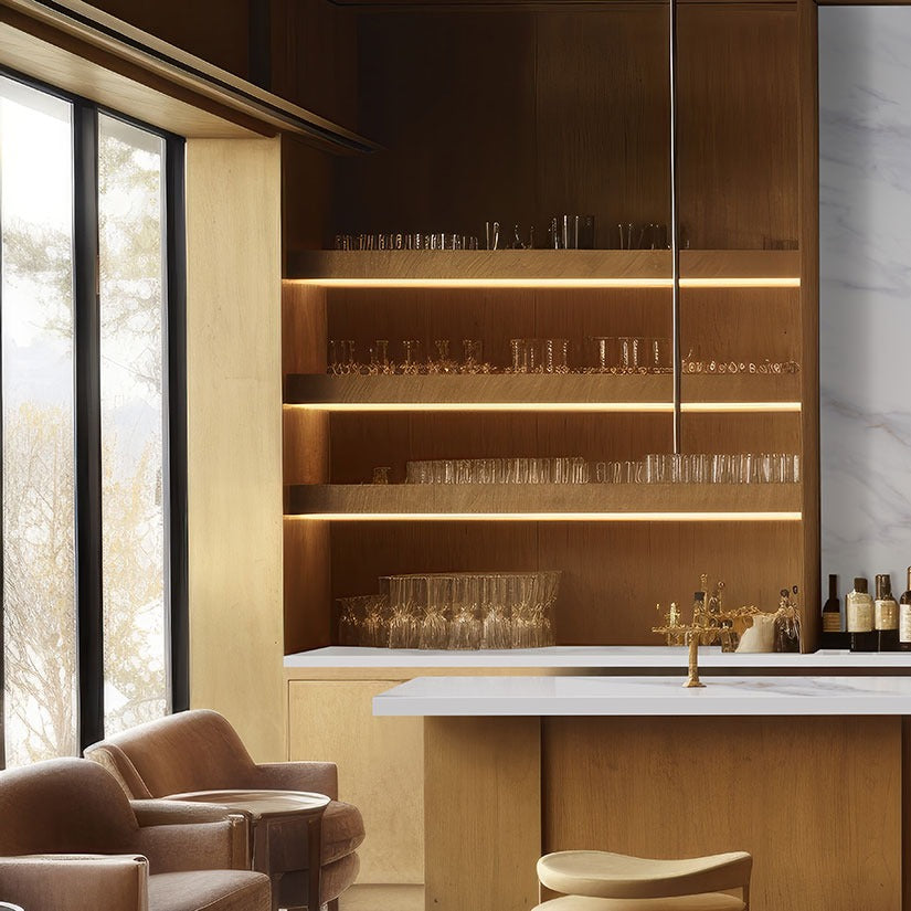 Calacatta Castana Q Plus quartz kitchen countertop installed in a room setting