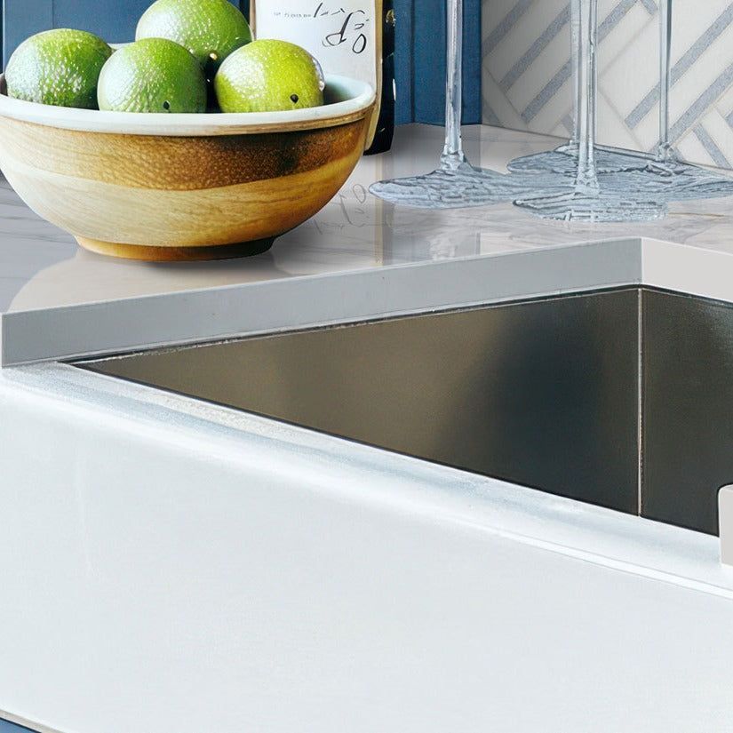 Calacatta Lapiza Q Plus quartz kitchen countertop installed in a room setting