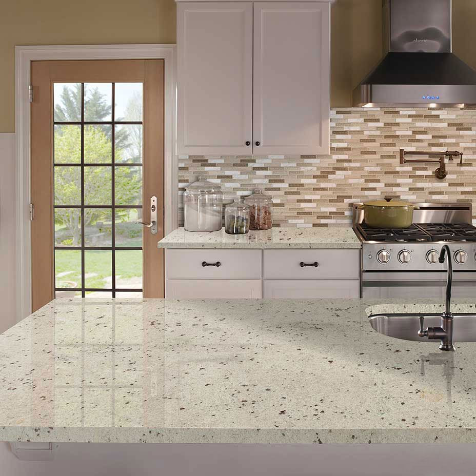Colonial White granite countertop installed in a kitchen