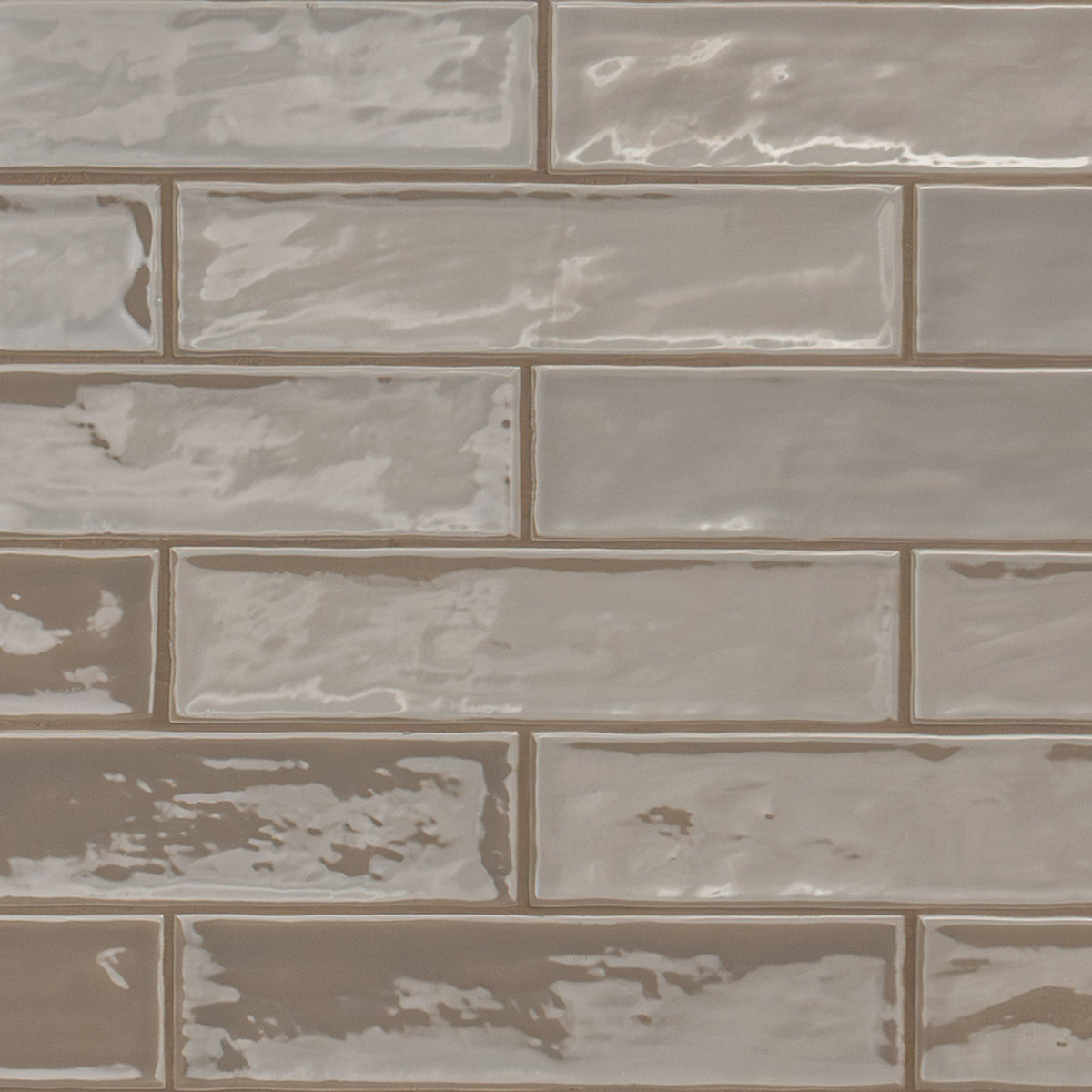 Terranello Umber ceramic tile, glossy finish, 2 by 8 inch view