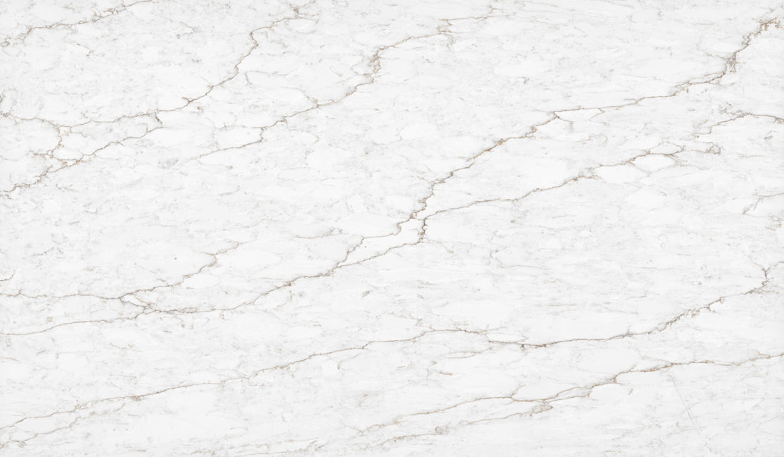 Delicato Salerno Matte silica free quartz slab by Stratus Surfaces, white with gold and taupe veining, matte finish