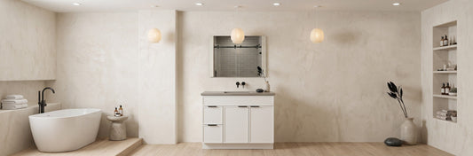 Modern commercial freestanding bathroom vanity with ample closed storage drawers and sleek stone countertop in a clean business restroom.