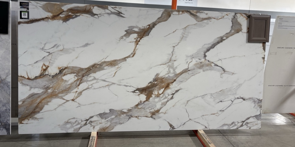 Lumina printed surface quartz full slab in showroom, white base with gold and grey veining
