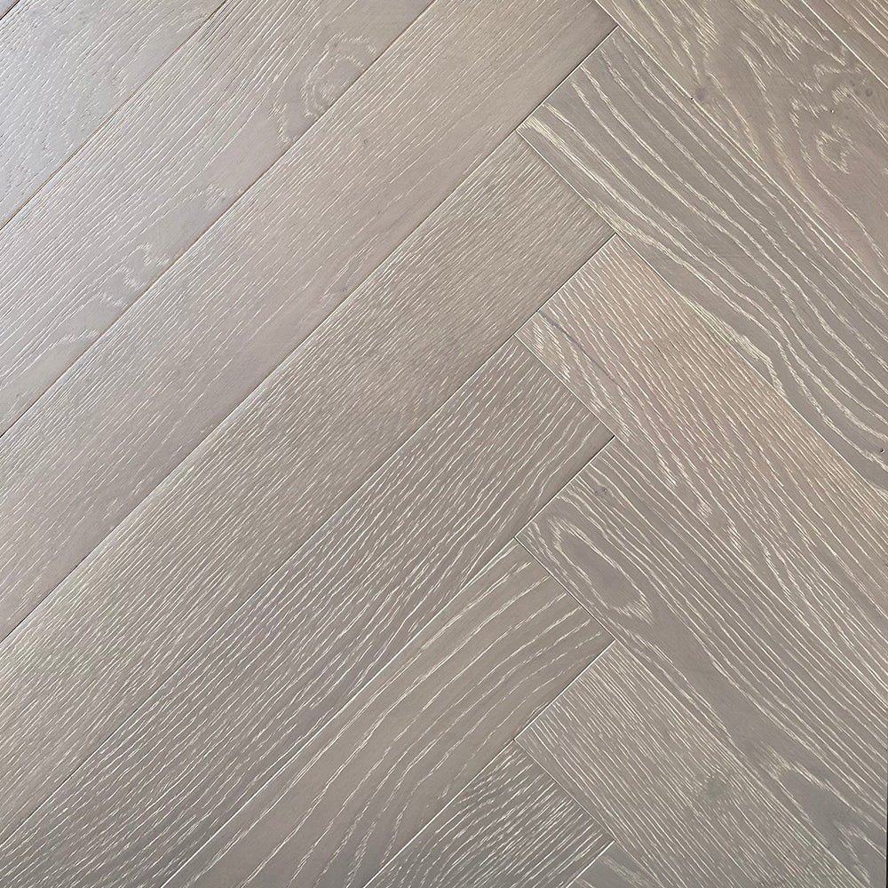 Herringbone Volcano Grey engineered European white oak flooring, herringbone blocks, wire brushed, character CD grade