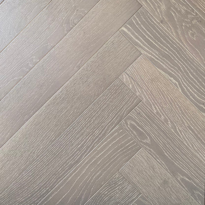 Herringbone Volcano Grey engineered European white oak flooring, herringbone blocks, wire brushed, character CD grade