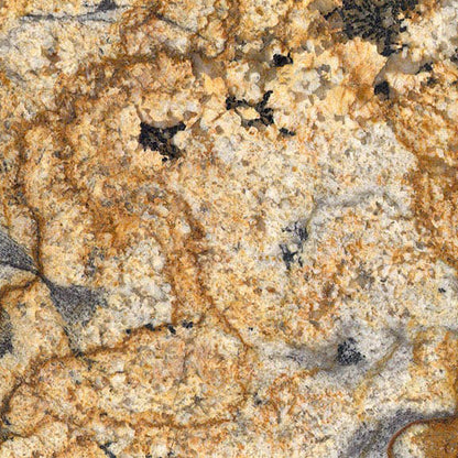 African Canyon granite slab, gold base with black and white cloudy granite pattern, polished finish