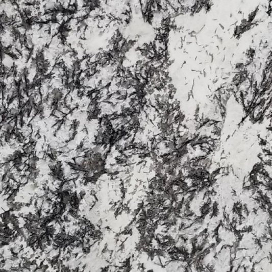 White Orion granite slab, white base with black cloudy granite pattern, polished finish