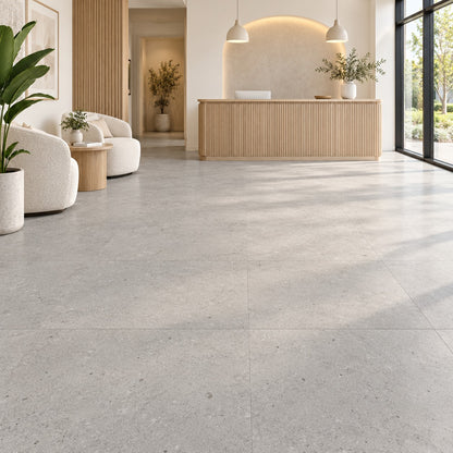 Loften Gravel Limestone LVT Glue Down Flooring installed in an office lobby