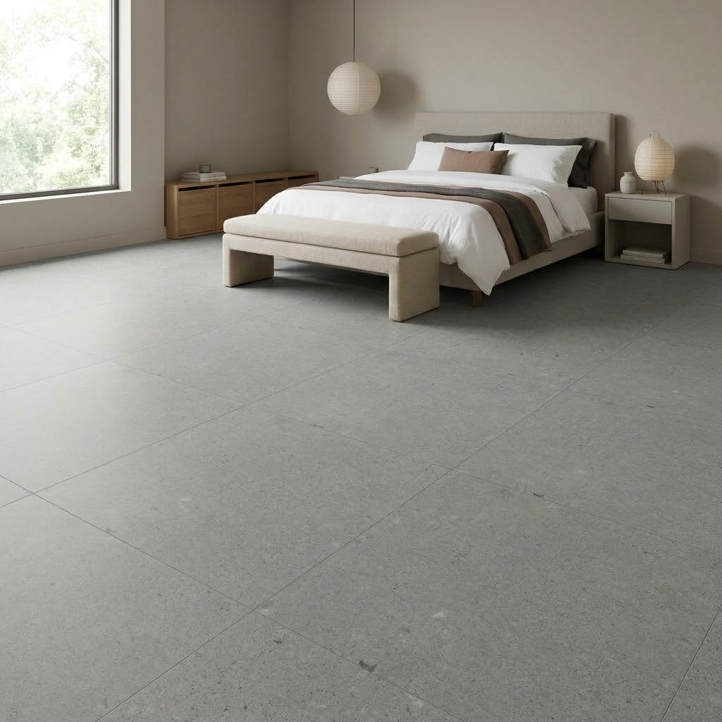 Loften Smoke Limestone LVT Glue Down Flooring installed in a bedroom