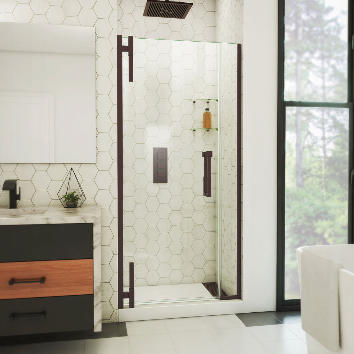 Ascend frameless pivot shower door with inline panel in Oil Rubbed Bronze, 32 to 41 1/2 inch width, 3/8 inch clear glass, shown in a bathroom
