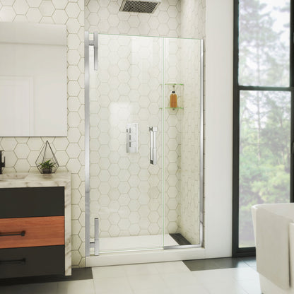 Ascend frameless pivot shower door with inline panel in Polished Chrome, 40 to 49 1/2 inch width, 3/8 inch clear glass, shown in a bathroom