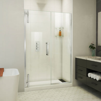 Ascend frameless pivot shower door with inline panel in Polished Chrome, 48 to 57 1/2 inch width, 3/8 inch clear glass, shown in a bathroom