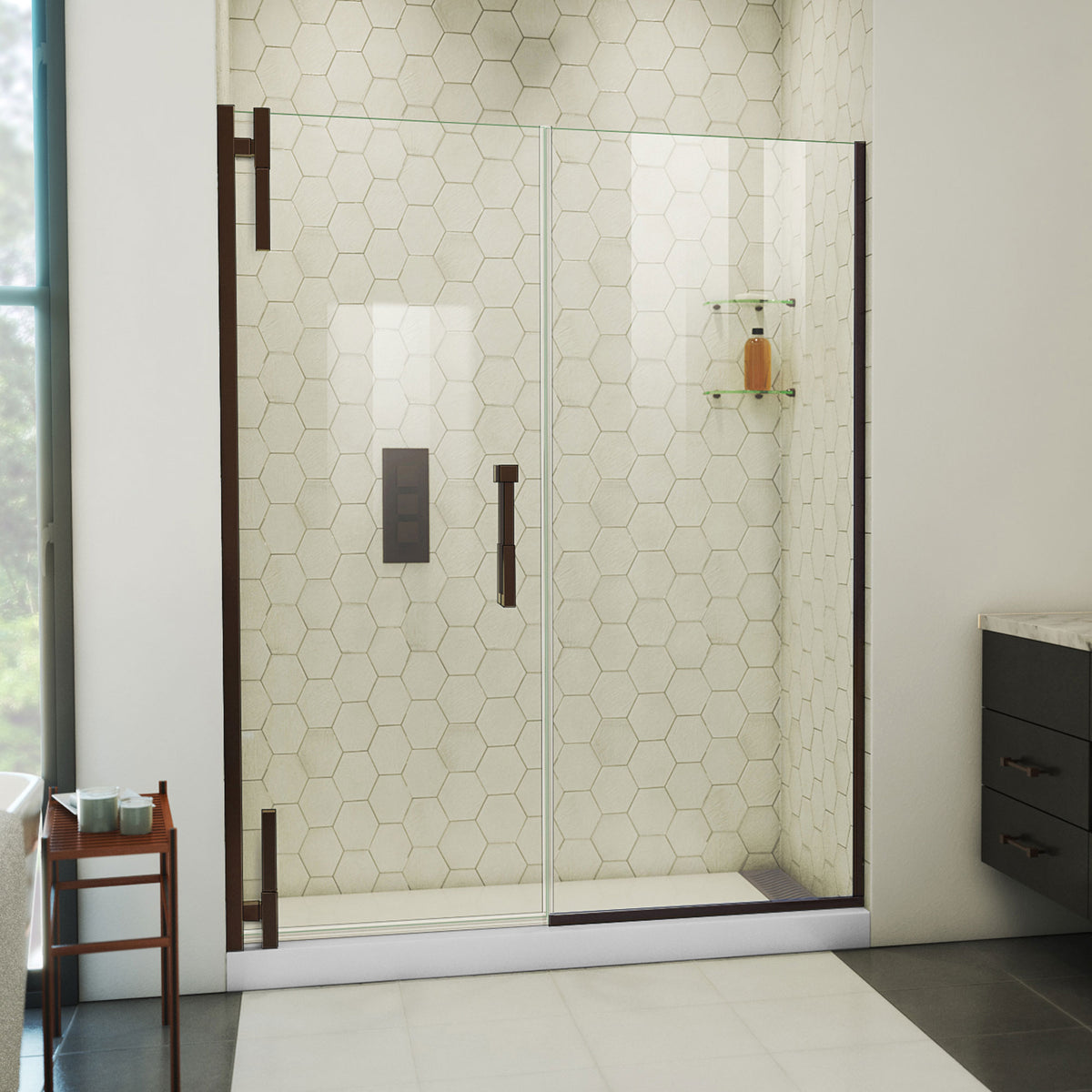 Ascend frameless pivot shower door with inline panel in Oil Rubbed Bronze, 56 to 65 1/2 inch width, 3/8 inch clear glass, shown in a bathroom