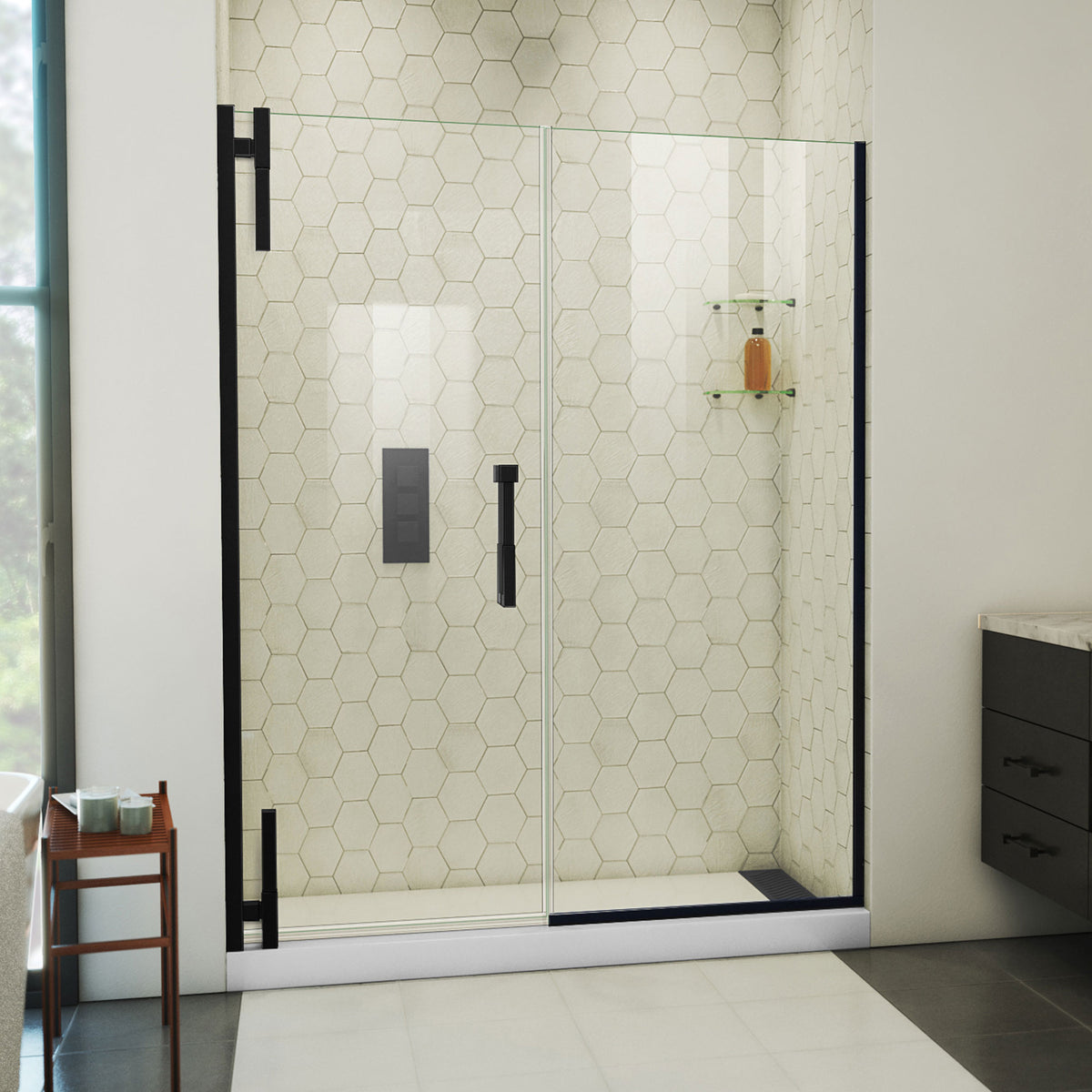 Ascend frameless pivot shower door with inline panel in Satin Black, 56 to 65 1/2 inch width, 3/8 inch clear glass, shown in a bathroom