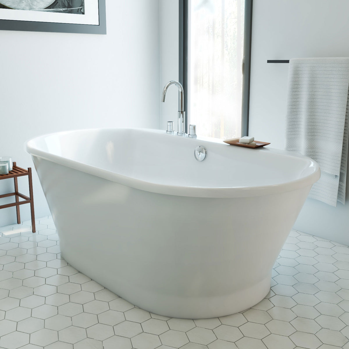 Caribbean 66 inch freestanding acrylic bathtub in gloss white, shown in a styled setting
