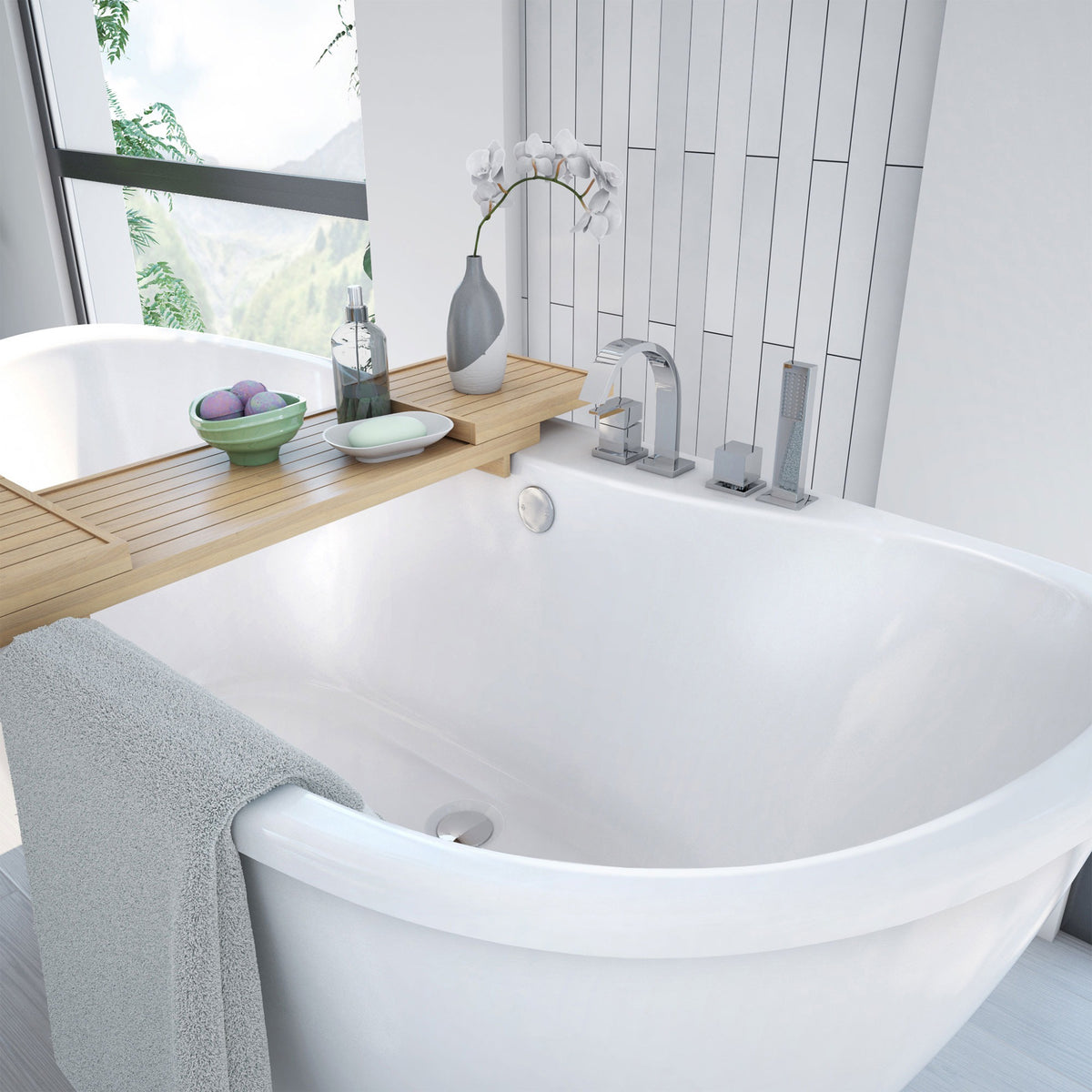 Caspian 60 inch freestanding acrylic bathtub in gloss white, shown in a styled setting