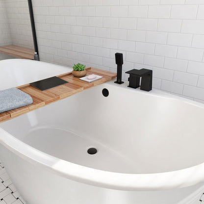 Caspian 66 inch freestanding acrylic bathtub in gloss white, shown in a styled setting