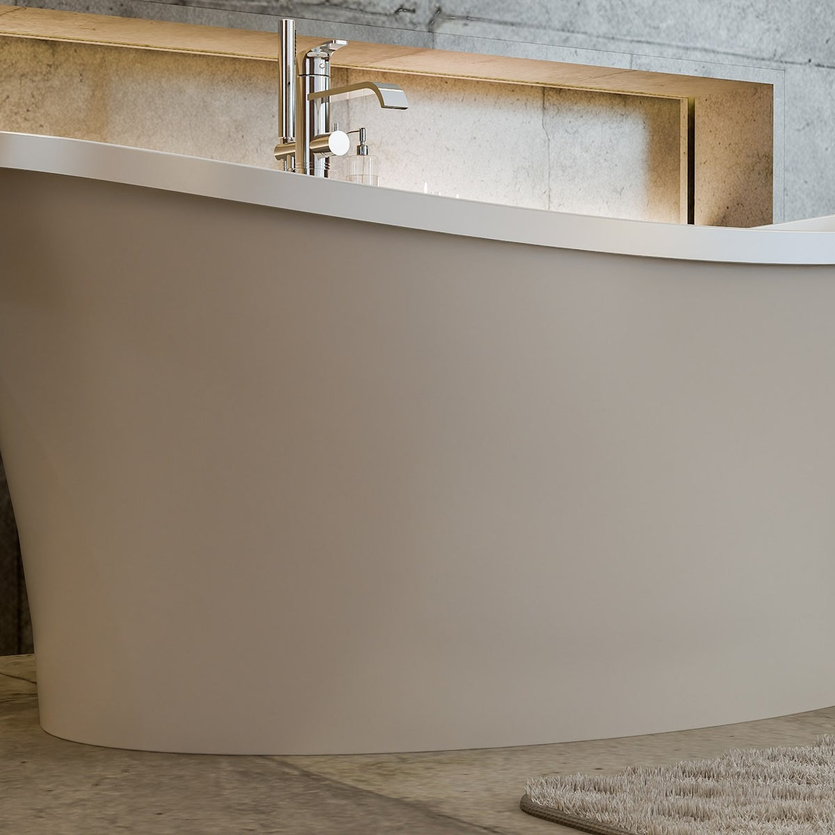 Continuum 66 inch freestanding acrylic bathtub in gloss white with Polished Chrome drain, shown in a styled setting