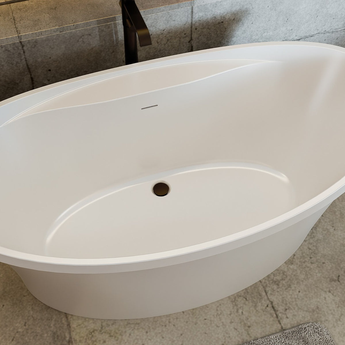 Continuum 66 inch freestanding acrylic bathtub in gloss white with Oil Rubbed Bronze drain, shown in a styled setting