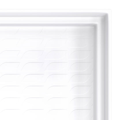 DreamStone barrier-free trench drain solid surface shower base pan, close up of the corner and slip resistant floor