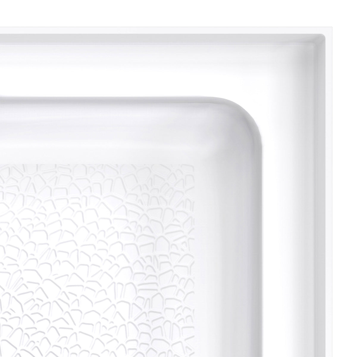 DreamStone double threshold corner solid surface shower base pan, close up of the corner and slip resistant floor