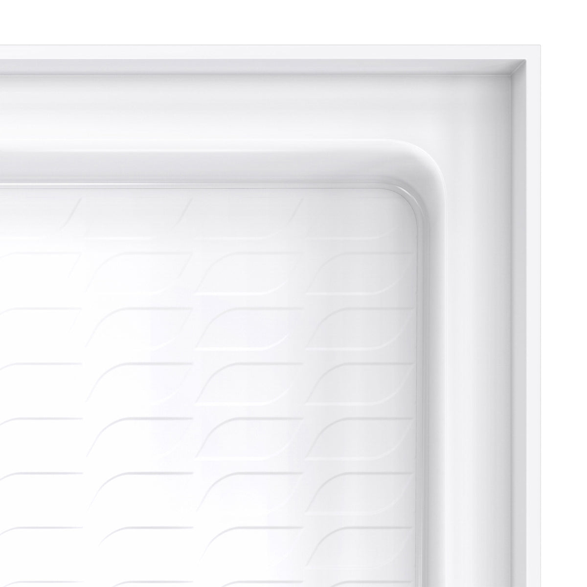 DreamStone low threshold ADA solid surface shower base pan, close up of the corner and slip resistant floor
