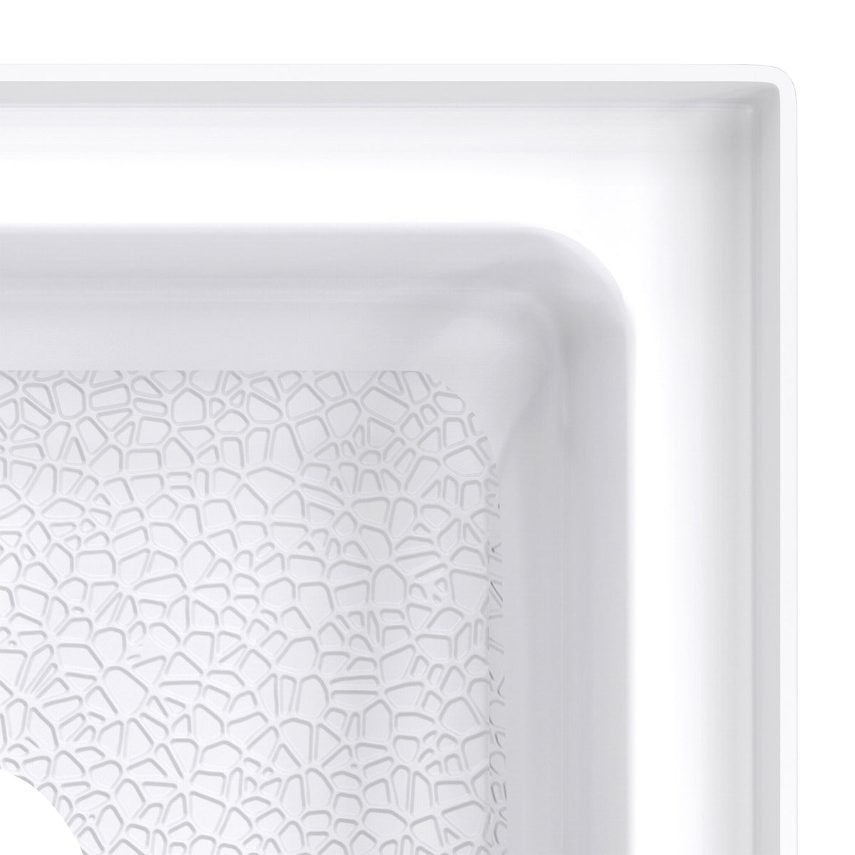 DreamStone neo-angle corner solid surface shower base pan, close up of the corner and slip resistant floor