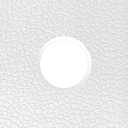 DreamStone neo-angle corner solid surface shower base pan, close up of the integral drain and textured floor
