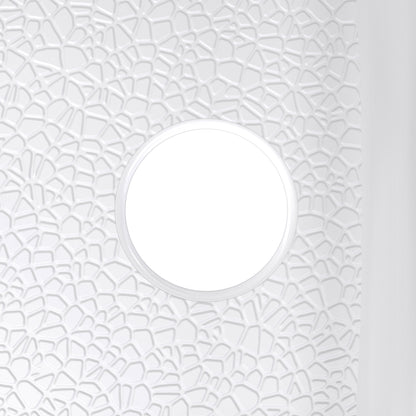 DreamStone single threshold solid surface shower base pan, close up of the integral drain and textured floor
