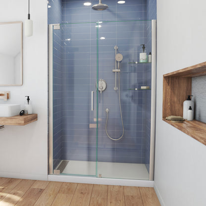 Elegance frameless pivot shower door in brushed nickel with wide inline panel for 49 to 62 inch openings