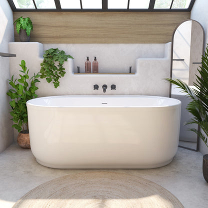 Encore 60 inch freestanding acrylic bathtub in gloss white with Brushed Nickel drain, shown in a styled setting