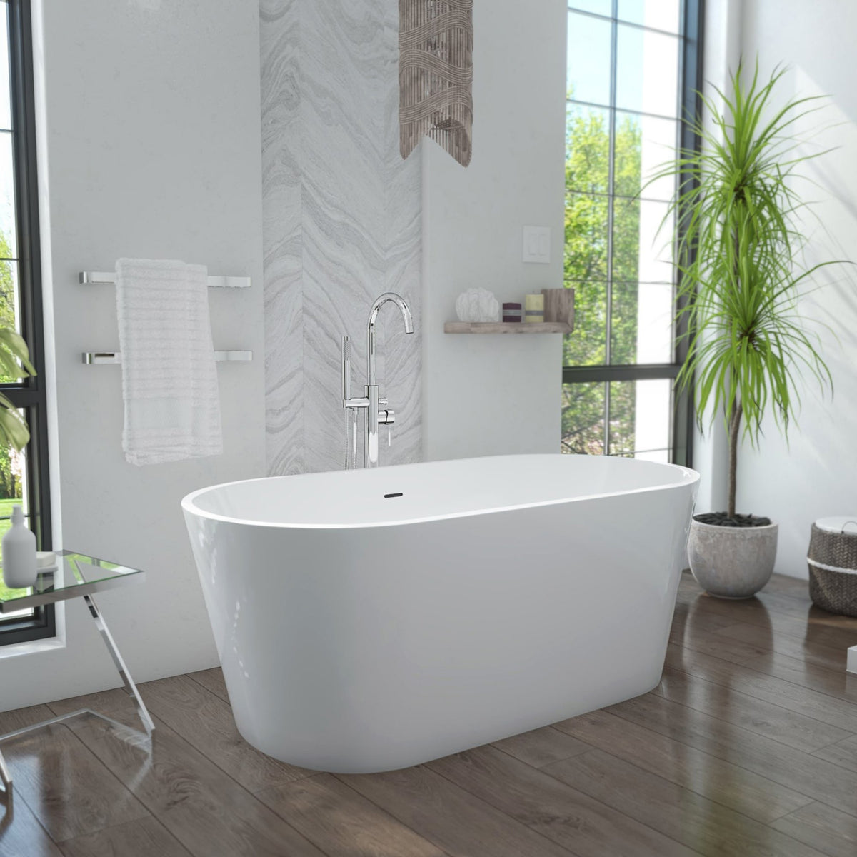 Enigma 63 inch freestanding acrylic bathtub in gloss white with Brushed Nickel drain, shown in a styled setting