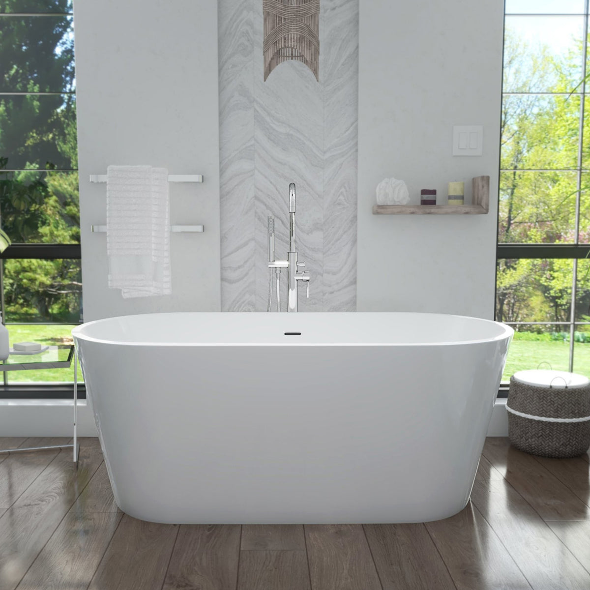 Enigma 63 inch freestanding acrylic bathtub in gloss white with Brushed Nickel drain, shown in a styled setting