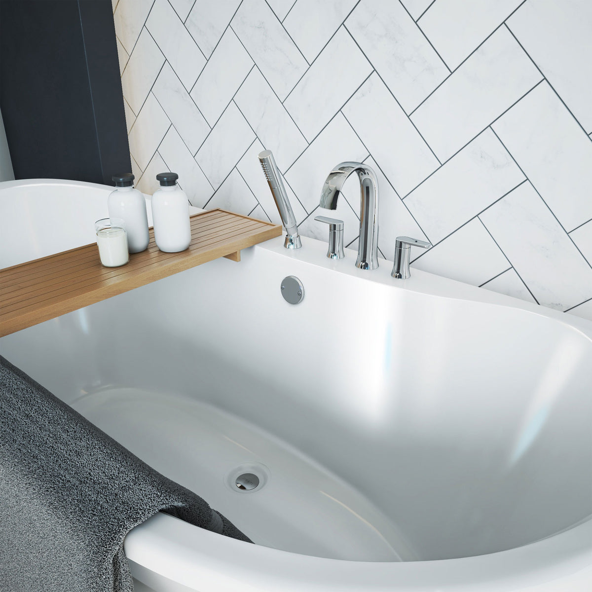 Montego 60 inch freestanding acrylic bathtub in gloss white, shown in a styled setting