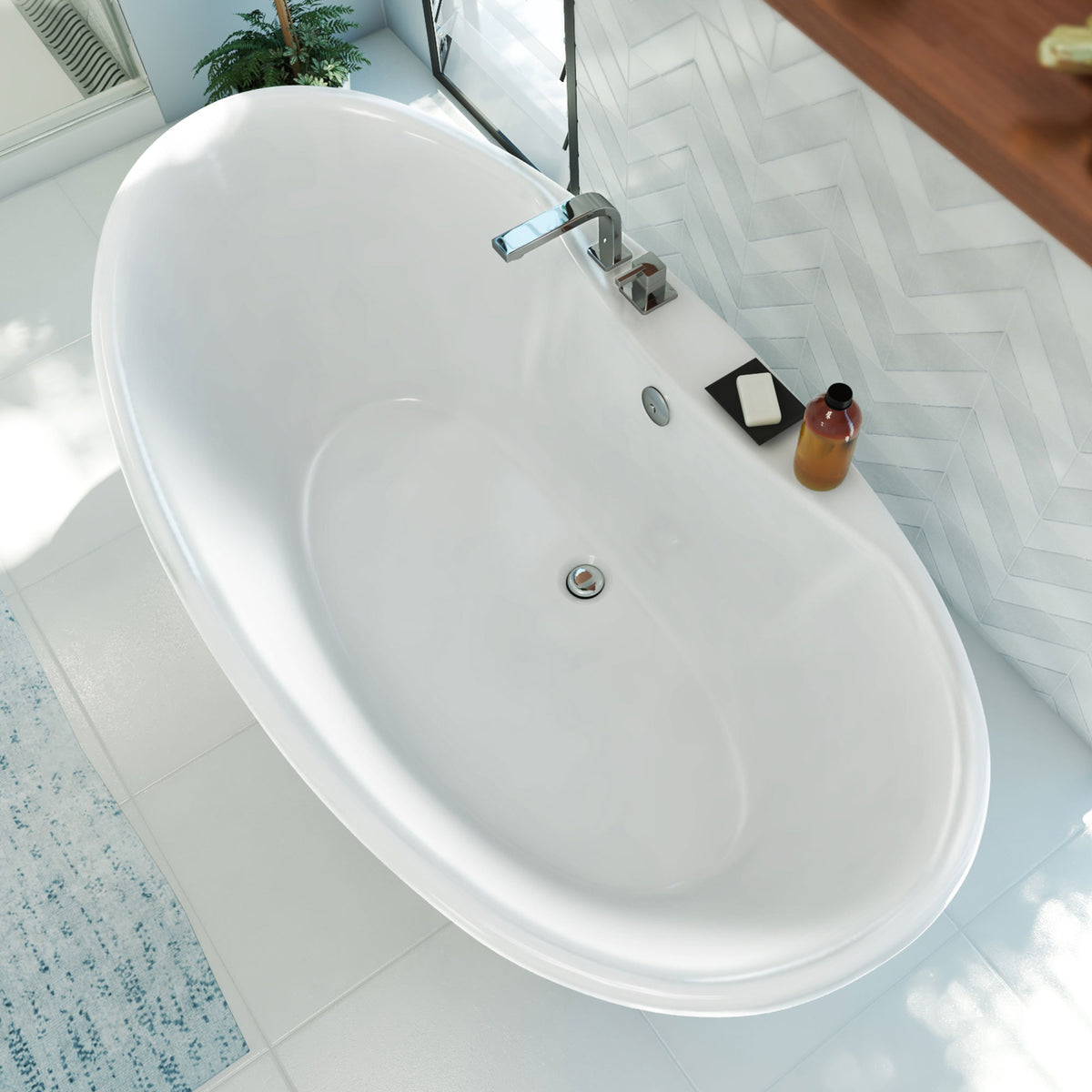 Montego 66 inch freestanding acrylic bathtub in gloss white, shown in a styled setting