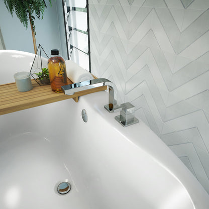 Montego 66 inch freestanding acrylic bathtub in gloss white, shown in a styled setting