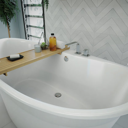 Montego 66 inch freestanding acrylic bathtub in gloss white, shown in a styled setting