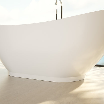 Prospero 69 inch freestanding acrylic bathtub in gloss white, shown in a styled setting