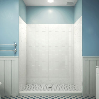 QWALL-VS acrylic alcove shower wall kit in white with vertical subway pattern installed over a shower base