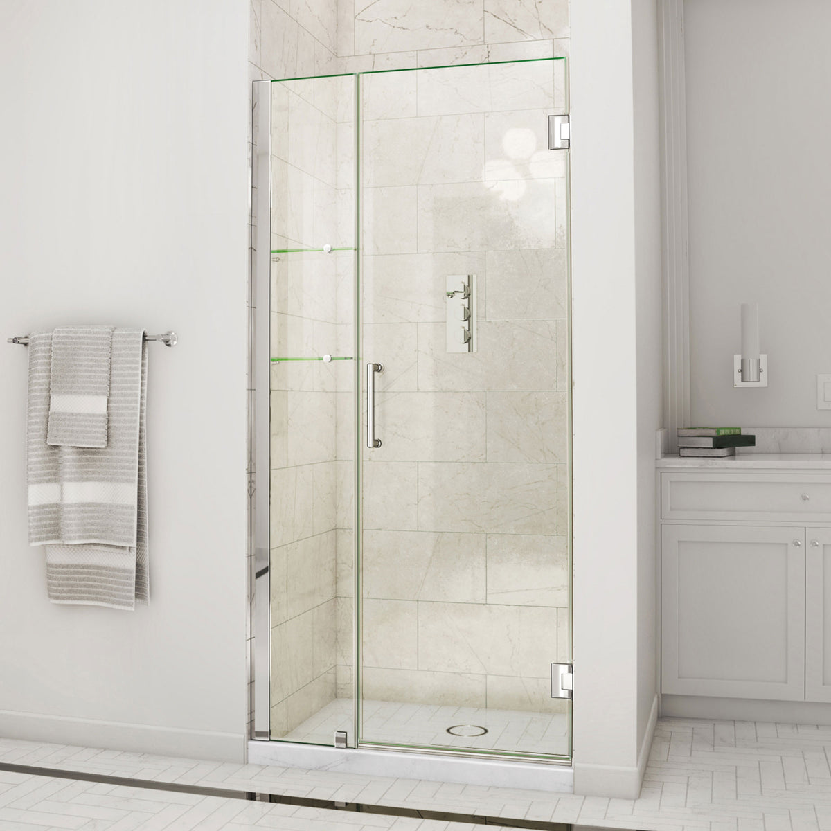 Unidoor Frameless Hinged Shower Door with Stationary Panel and Glass Shelves with 12 inch inline panel in Polished Chrome, installed in a bathroom