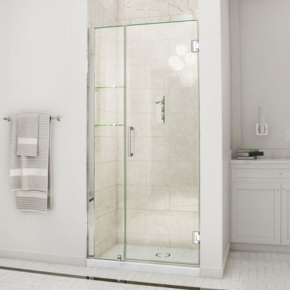 Unidoor Frameless Hinged Shower Door with Stationary Panel and Glass Shelves with 12 inch inline panel in Polished Chrome, installed in a bathroom