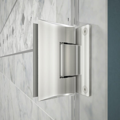 Solid brass wall to glass hinge on the Unidoor Frameless Hinged Shower Door with Stationary Panel and Glass Shelves in Polished Chrome