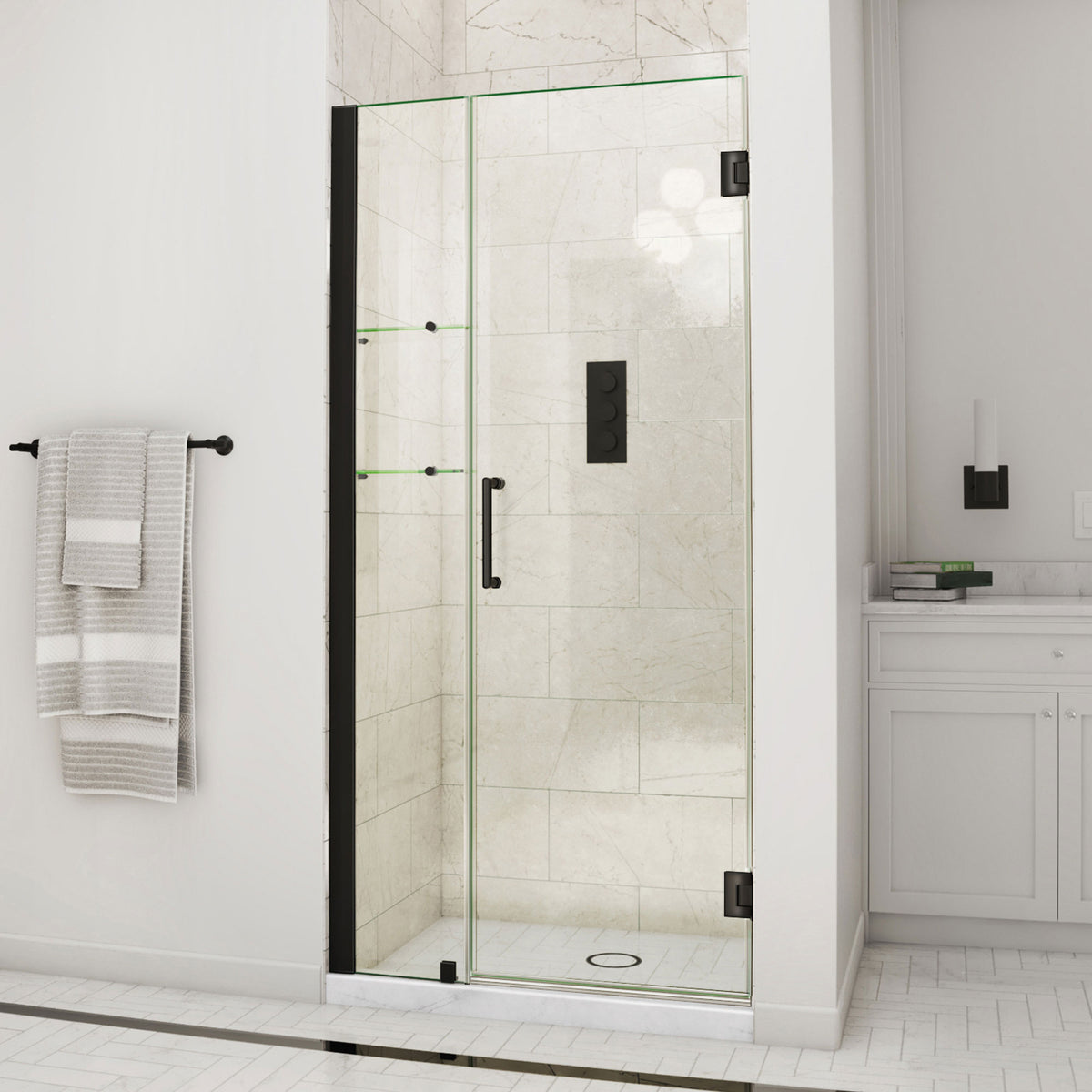 Unidoor Frameless Hinged Shower Door with Stationary Panel and Glass Shelves with 12 inch inline panel in Satin Black, installed in a bathroom