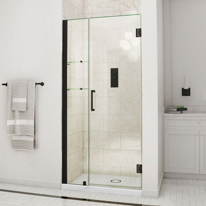 Unidoor Frameless Hinged Shower Door with Stationary Panel and Glass Shelves with 12 inch inline panel in Satin Black, installed in a bathroom