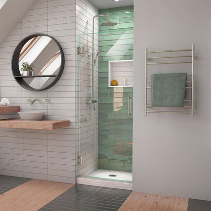 Unidoor-LS Frameless Hinged Shower Door in Brushed Nickel, installed in a bathroom